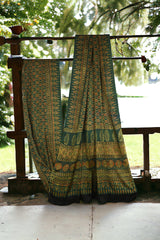 ajrakh modal silk sarees - glistening emerald & gold symphony