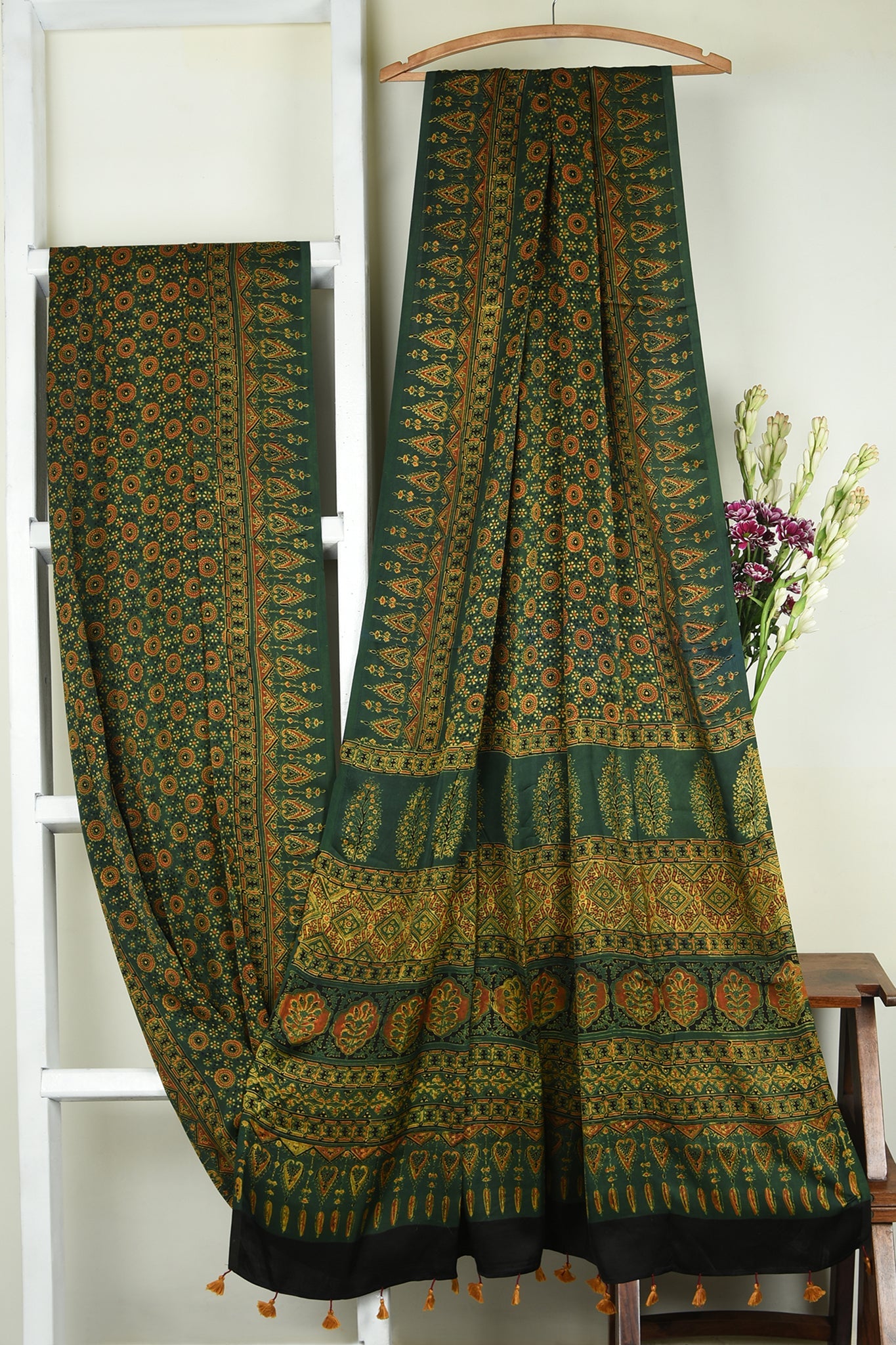 ajrakh modal silk sarees - glistening emerald & gold symphony
