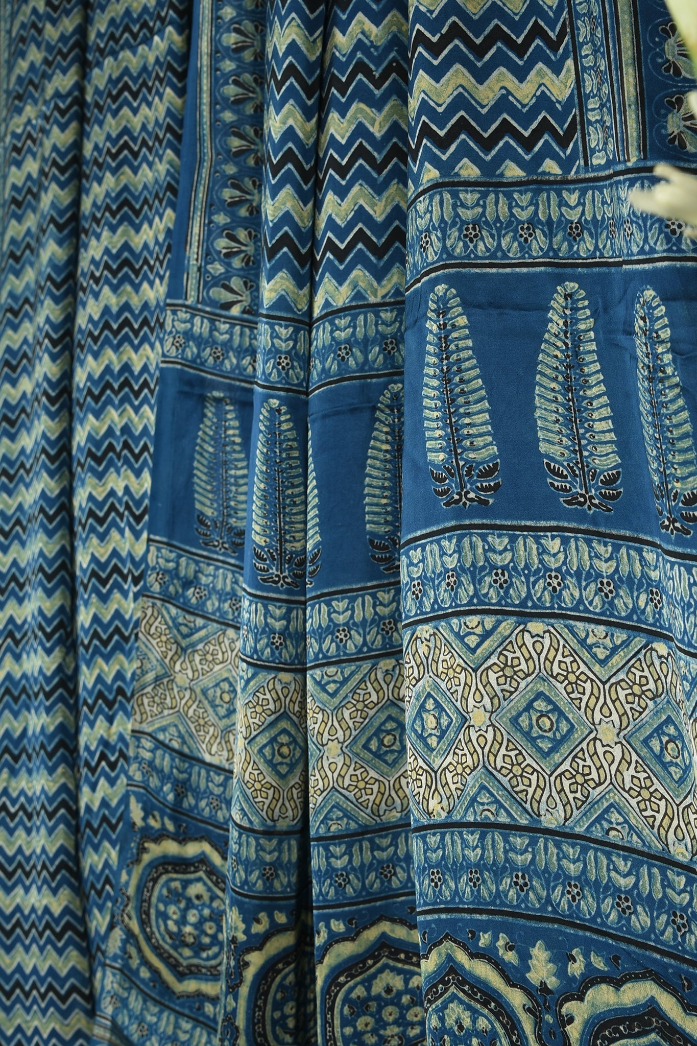 ajrakh modal silk sarees - indigo zigzag & waterscape delight