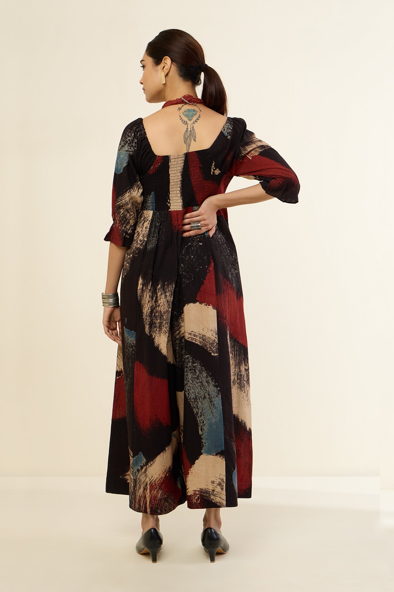 Ebony Scarlet Brush Strokes Off Shoulder Smocked Jumpsuit